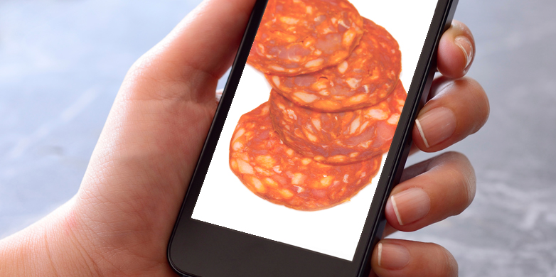 Vergrösserte Ansicht: Chorizo-Scheiben auf Smartphone-Screen