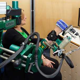 Test person training with the rehab robot