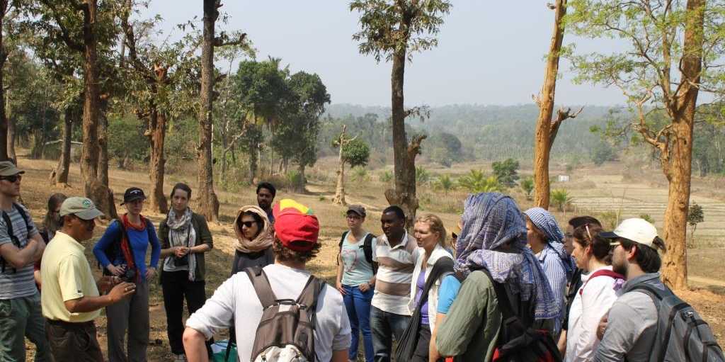 Enlarged view: Students discussing with organic farmer