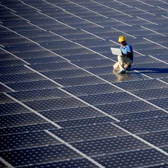 Enlarged view: Engineer on solar panels