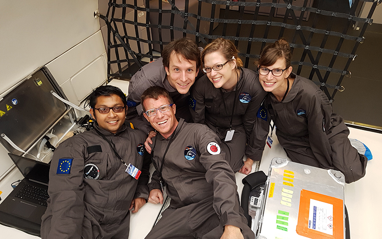 The Stocker team in the Zero-G airplane with their experimental setups.