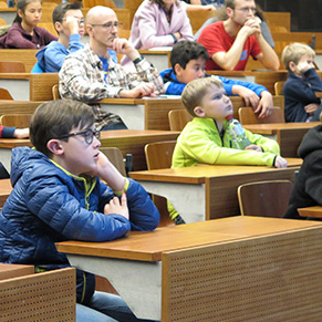 Children listen to an lecture