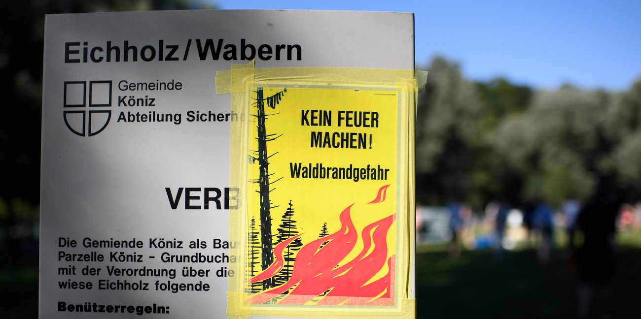 A strict ban on outdoor fires was in force during another extremely dry and hot Swiss summer. (Photograph: Keystone/Anthony Anex)