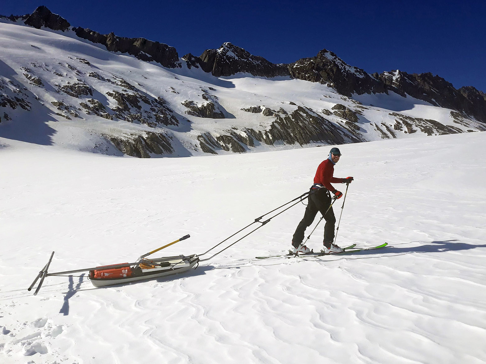 Enlarged view: The easiest way to move was on skis: a researcher transports material and tools.
