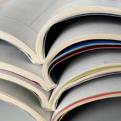 a stack of scientific magazines and journals