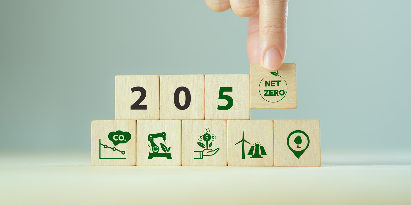 Wooden blocks with illustrations showing how Co2 emissions can be reduced