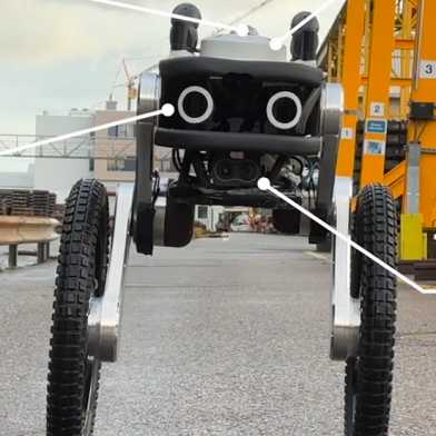 The Ascento robot on the road; equipped with a 360 degree camera, microphone, speaker, LEDs and a thermal imaging camera.