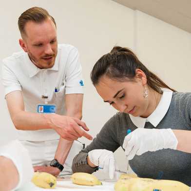 Students in the Bachelor of Human Medicine program learn how to suture wounds using bananas.