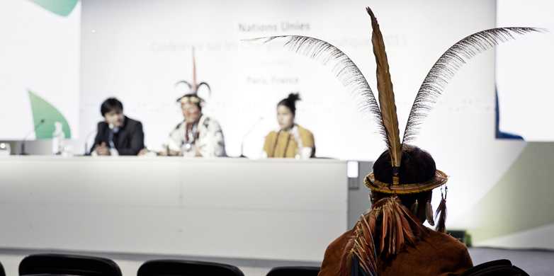 Enlarged view: Press conferences in Paris - such as this one, led by the indigenous peoples - are being transmitted live in the CHN building. (Photo: COP 21 / Benjamin Géminel)