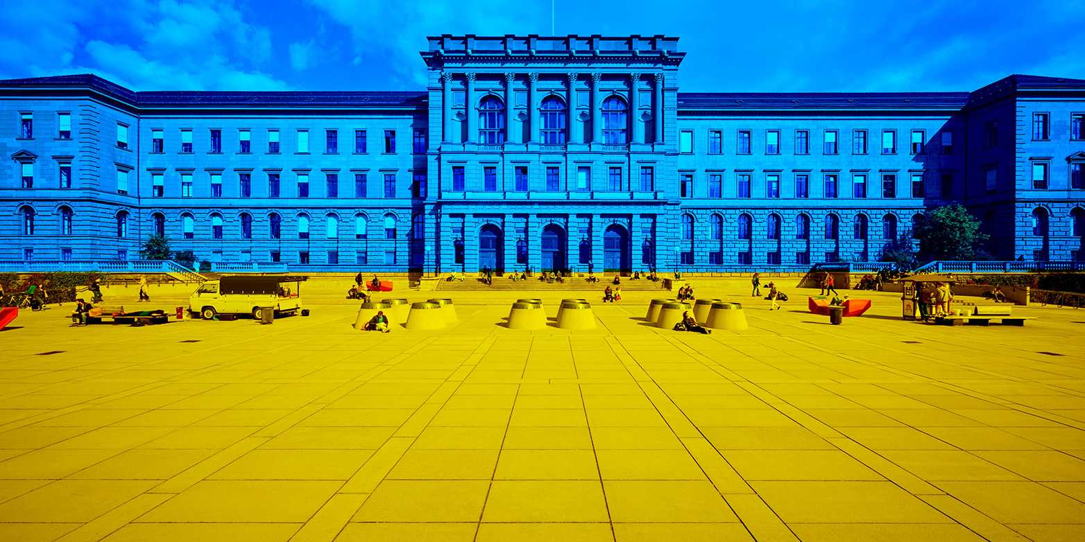 A picture of the ETH main building, coloured in blue and yellow, the colours of Ukraine.